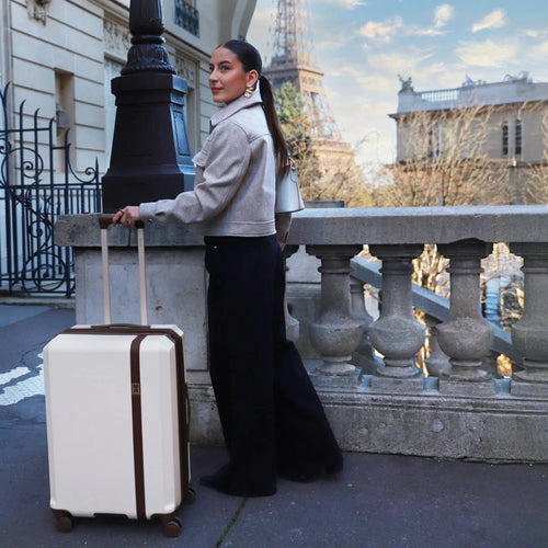 ELLE Luxe Journey 3 Piece Expandable Retro Spinner Luggage Set in champagne demonstrating practical use