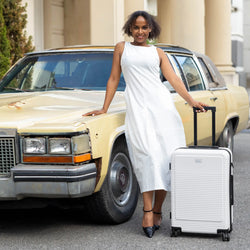 ELLE Passage Expandable Sleek 3-Piece Luggage Set in White demonstrating practical use