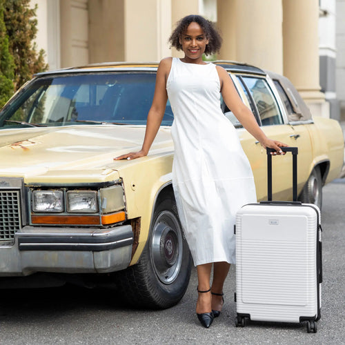 ELLE Passage Expandable Sleek 3-Piece Luggage Set in White demonstrating practical use