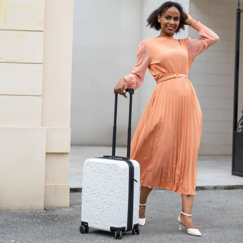 ELLE Wayfarer Expandable Sleek Monogram 3-Piece Luggage Set in Navy demonstrating practical use