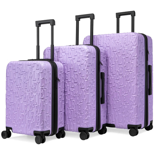 Angle view of ELLE Wayfarer Expandable Sleek Monogram 3-Piece Luggage Set in Navy