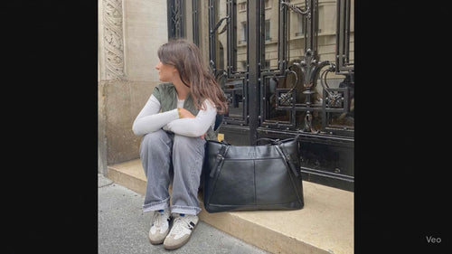 Leisure Luxe Weekender by a model on the streets of Paris