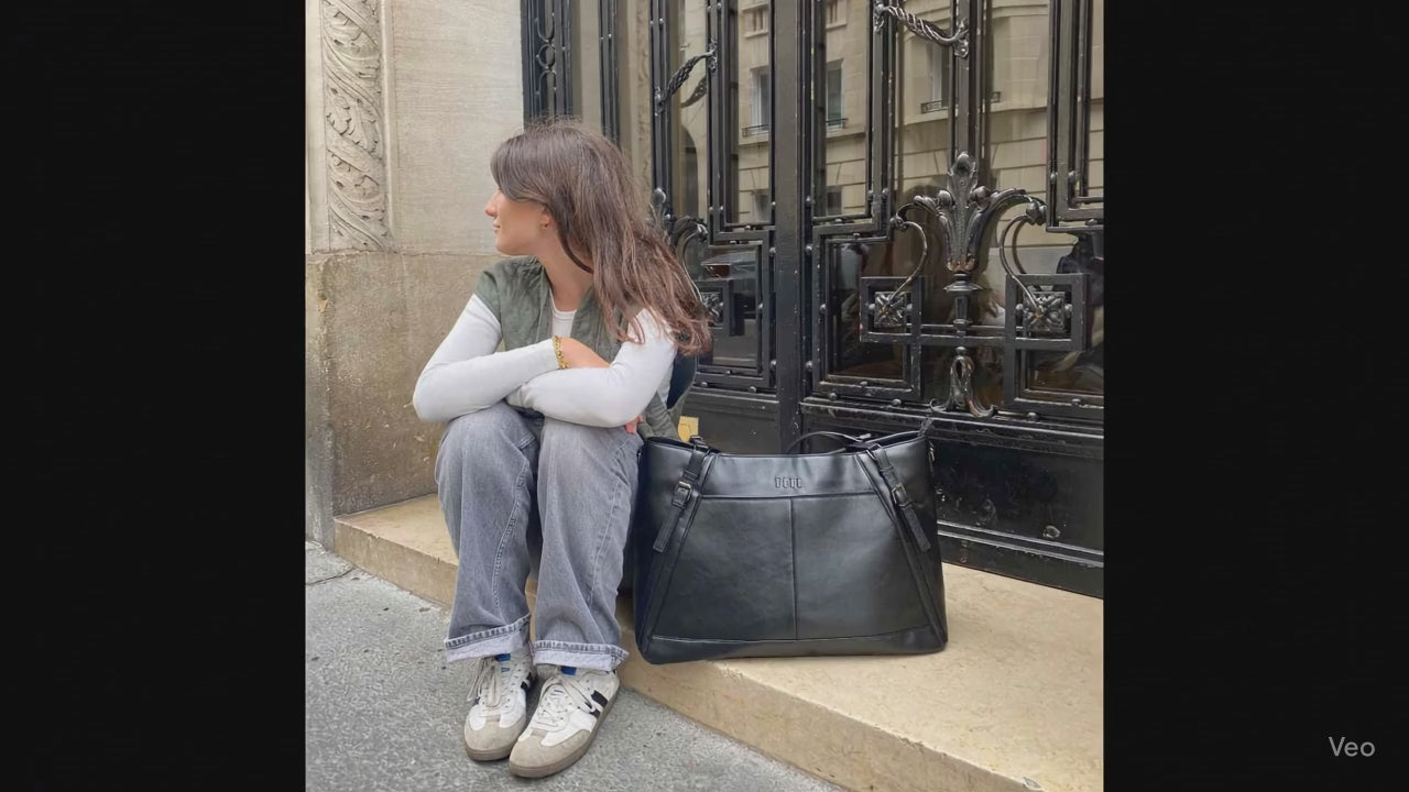 Leisure Luxe Weekender by a model on the streets of Paris
